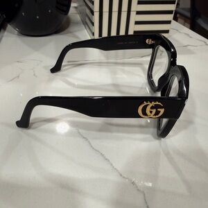Gucci Black Glasses with Gold Accents